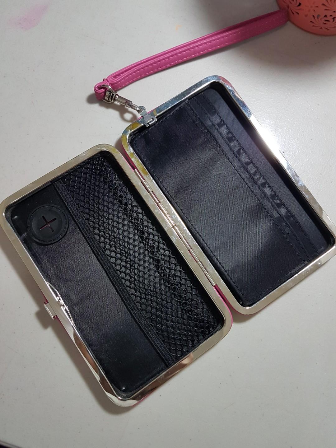 Wallet/phone holder/car holder (Category: Other Bottoms) located in Quezon City. Submitted by shekina21 (Listing ID 196403400, Image 2). Description: ✅Bought in Claire's for P1150 ✅Used thrice ✅ useful for on-the-go type ✅fits in a lot of cash and cards.