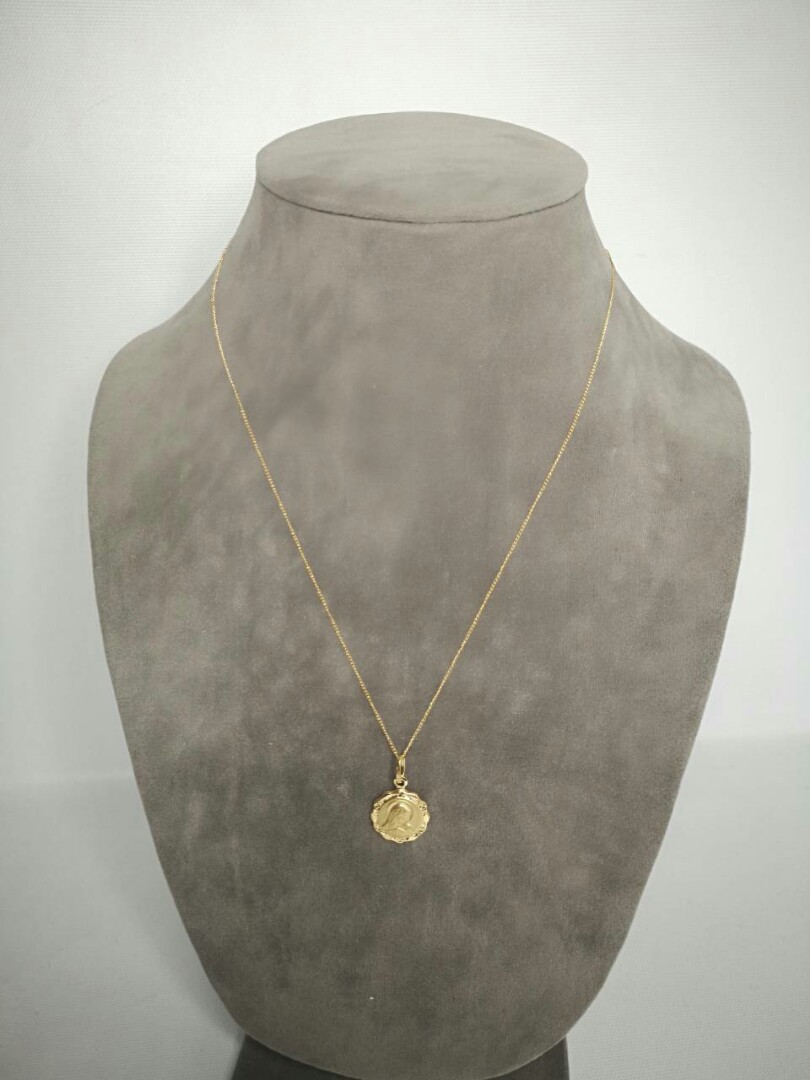 necklace with mama mary pendant