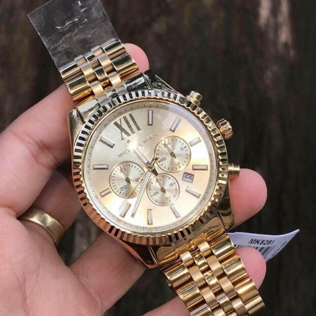 mk lexington gold tone watch