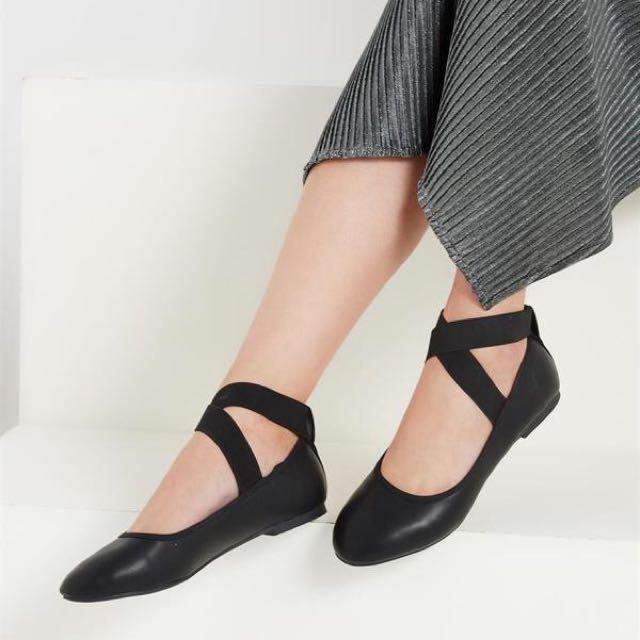 black flats with criss cross straps