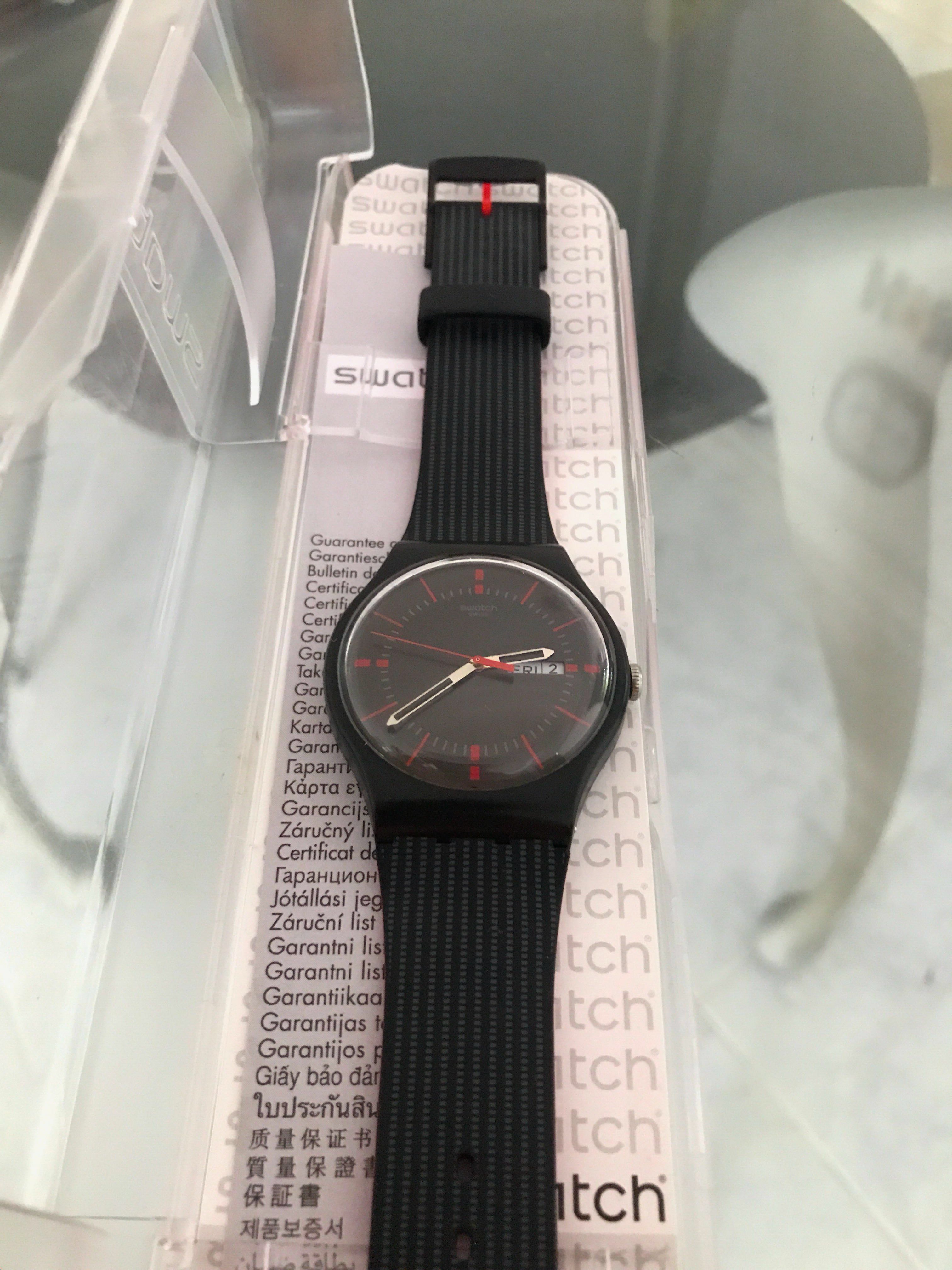 Swatch hotsell black red