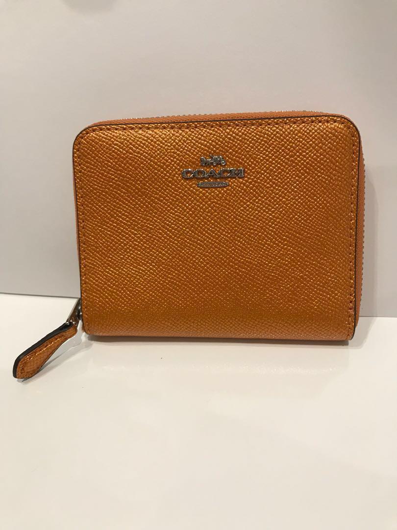coach tangerine wallet