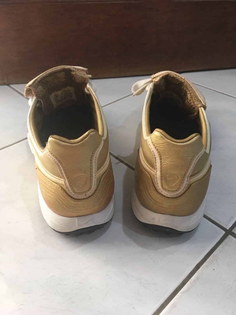 mens gold nike trainers