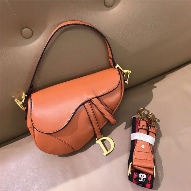 orange dior saddle bag