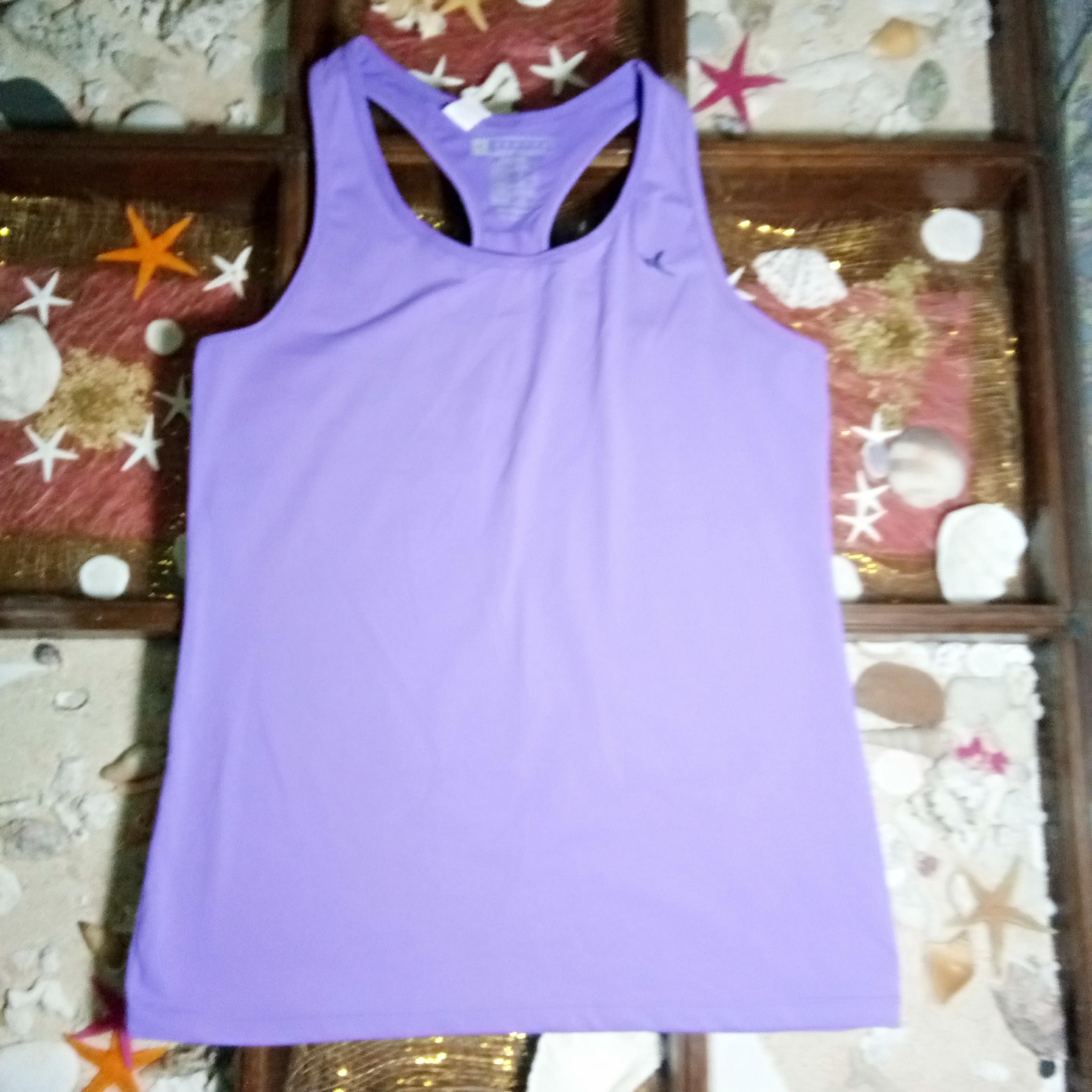 Dri-fit shirt (Category: Activewear) located in Quezon City. Submitted by rainbowpride (Listing ID 197234254, Image 2). Description: Used. In great condition. Domyos tank top light weight, breathable fabric Fits small to medium built.