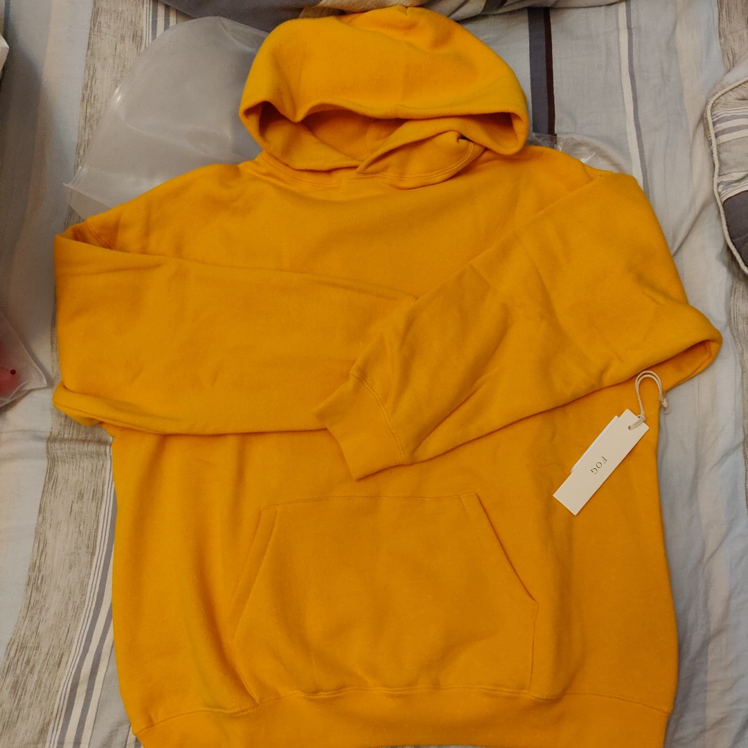 essentials yellow hoodie