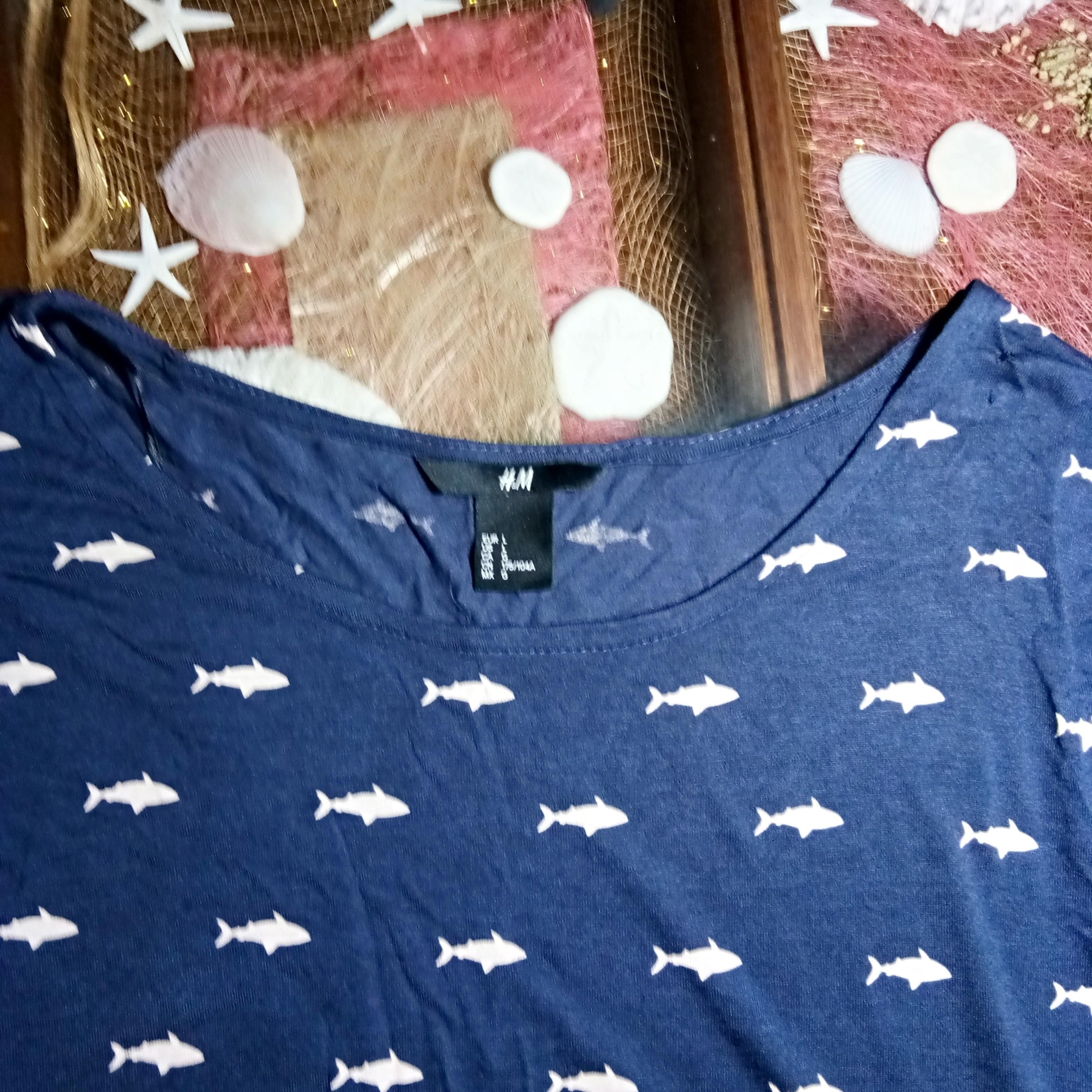 H&M long sleeves shirt (Category: Longsleeves) located in Quezon City. Submitted by rainbowpride (Listing ID 197280160, Image 3). Description: Used. In great condition. Super soft and comfy to wear Blue shark print long sleeved shirt by H&M.