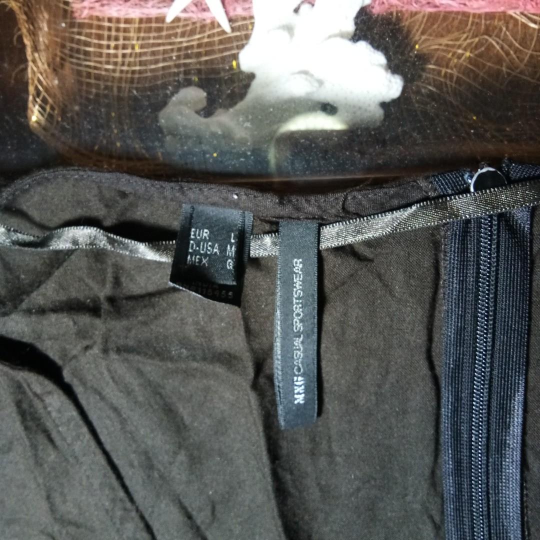 Mango black dress (Category: Dresses) located in Quezon City. Submitted by rainbowpride (Listing ID 197281814, Image 3). Description: Used. In excellent condition. Soft, light, very comfortable to wear. Black dress by Mango..