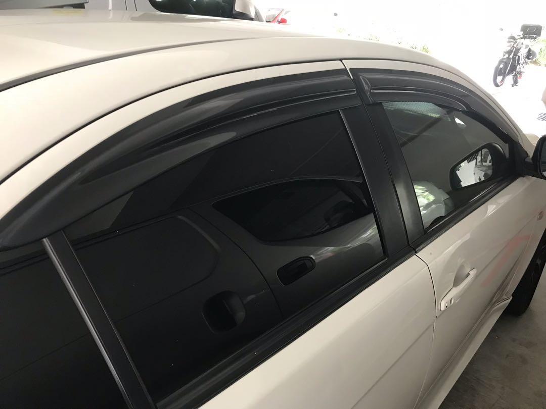 Lancer store window visor