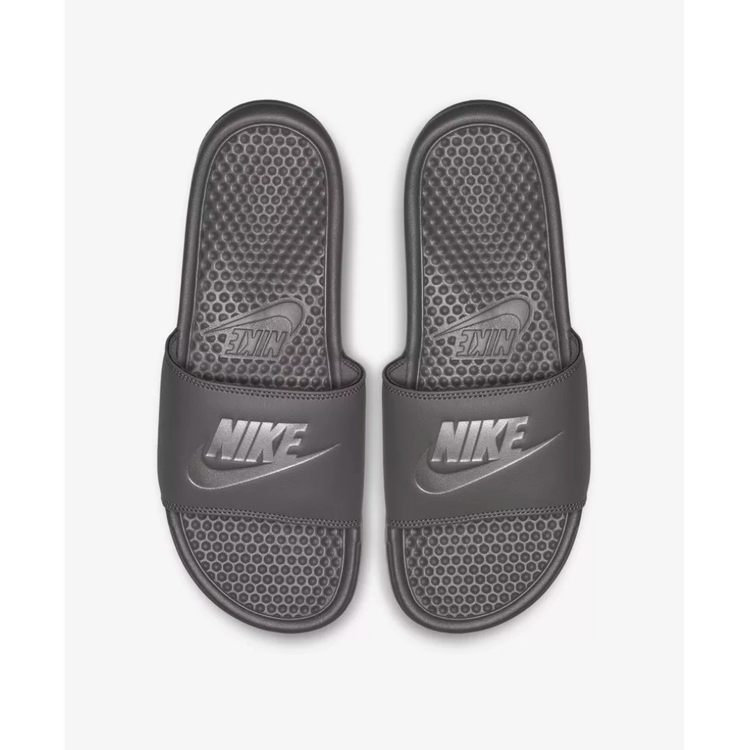 silver nike sliders