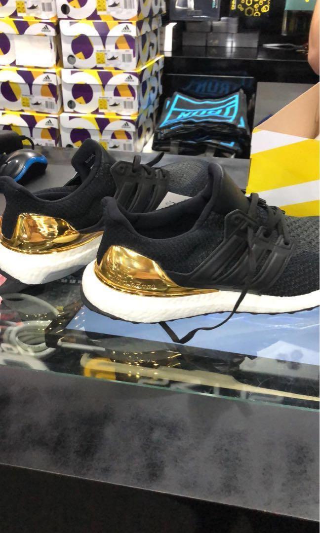 Adidas ultra boost hotsell gold medal kaufen