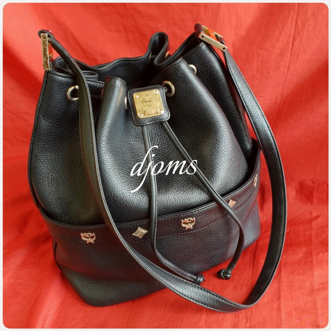 MCM mini bucket sling bag, Luxury, Bags & Wallets on Carousell