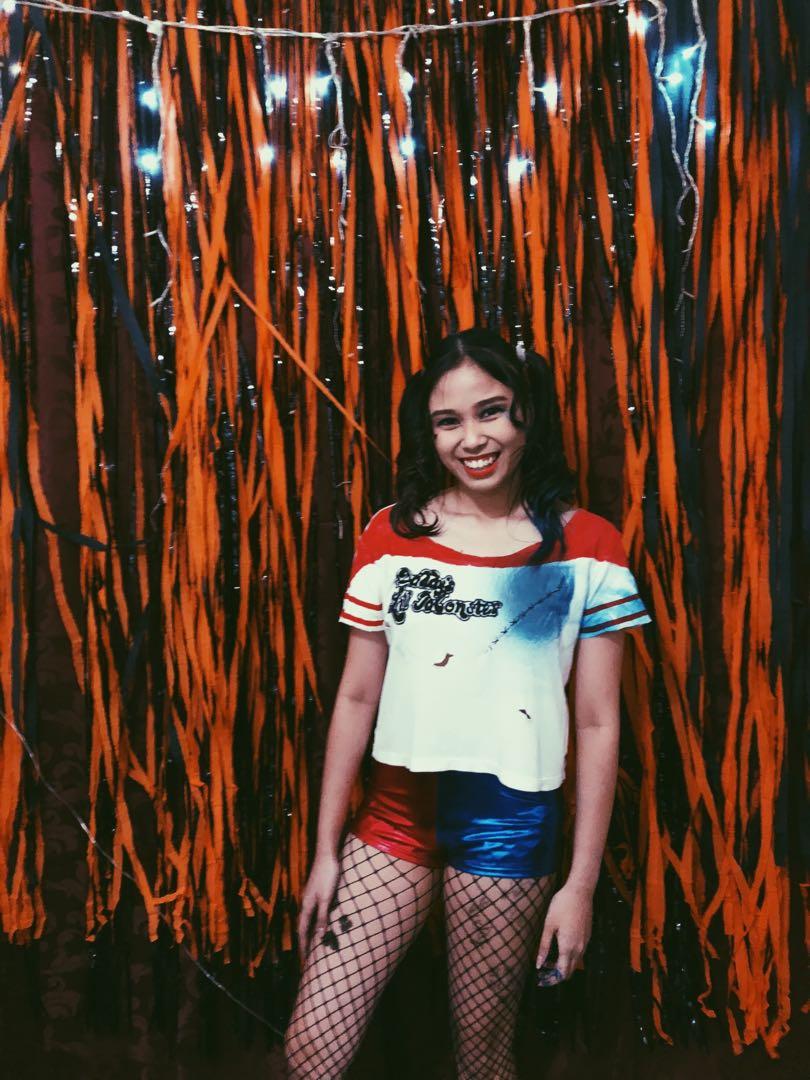 Harley Quinn Costume (Category: Traditional & Ethnic wear) located in Manila. Submitted by dominique227_ (Listing ID 197907329, Image 1). Description: Used once for halloween party. Includes: 👻 Harley’s top 👻 Shorts 👻 Net Stockings 👻 Red and Blue hair sprays 👻 hand gloves (black) (not worn in the picture).