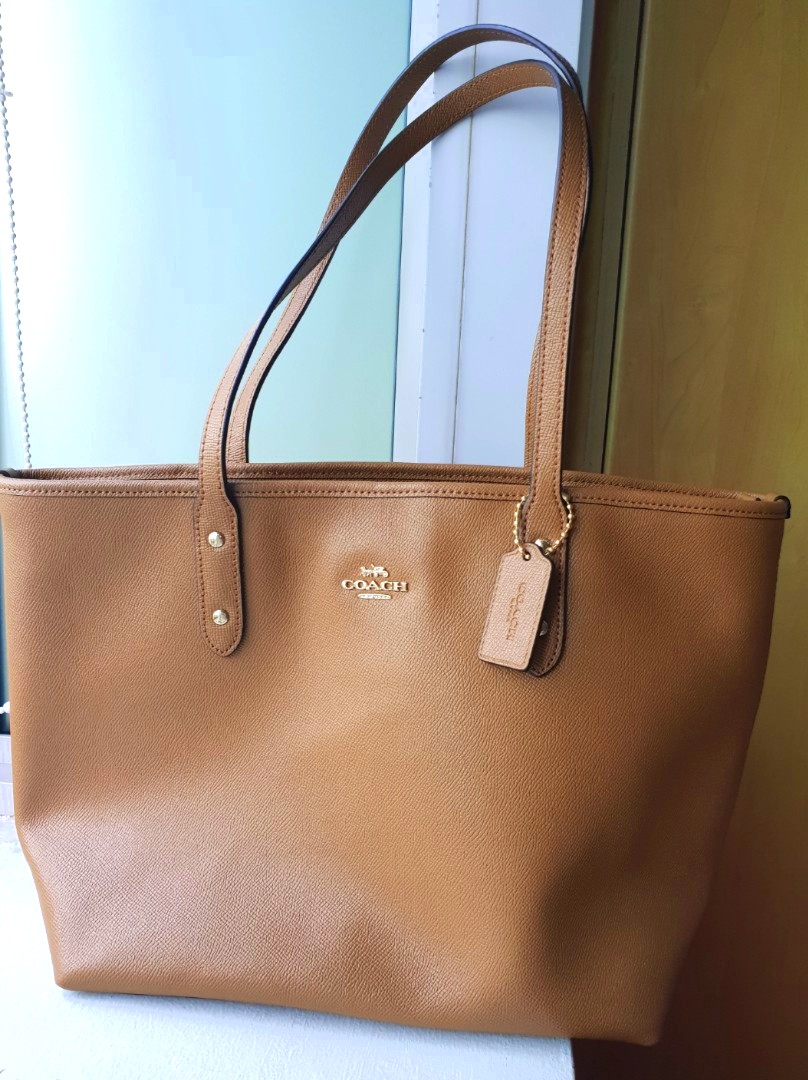 coach city zip tote light saddle