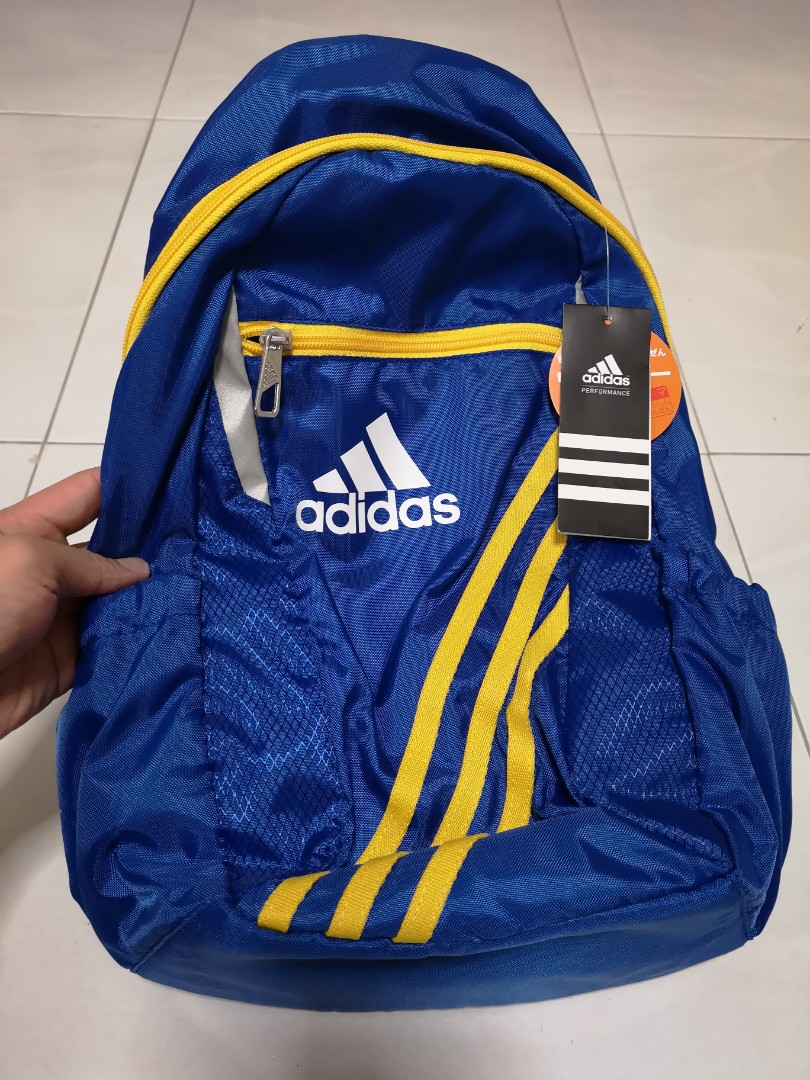 blue and yellow adidas backpack