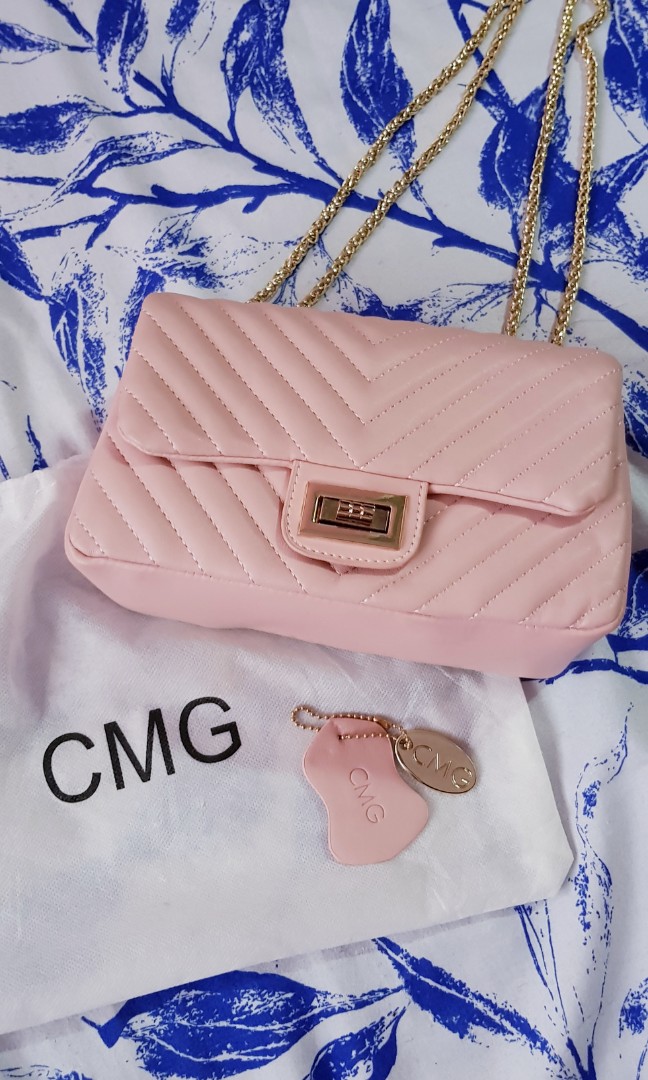 pink purse with chain strap