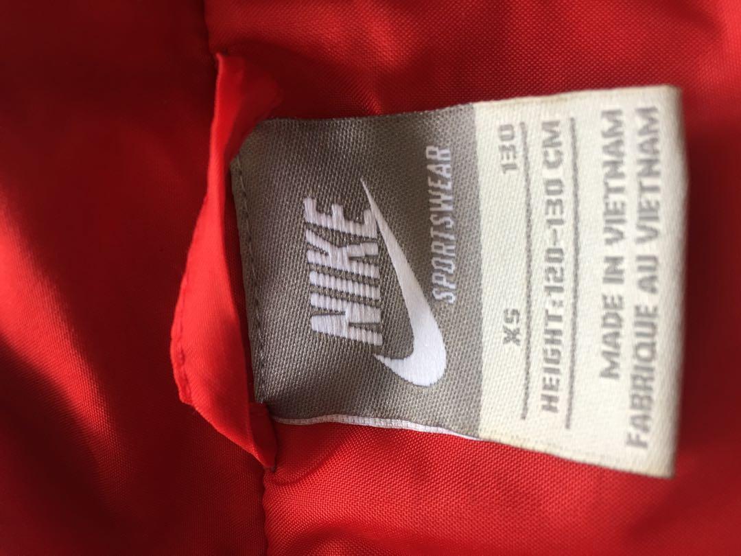 Nike jacket (Category: Babies & Kids Fashion) located in Singapore. Submitted by pokemon22 (Listing ID 197991069, Image 2). Description: Nike Down jacket. Keeps warm. Super comfy. .