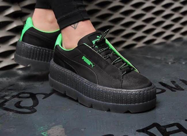 puma black green shoes