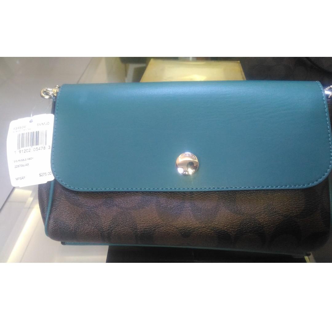 Coach reversible crossbody 2025 in signature coated canvas
