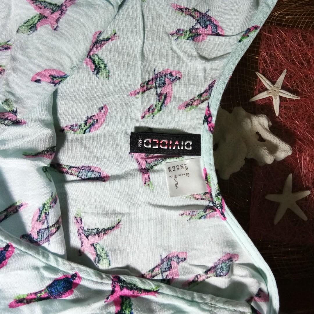 H&M dress (Category: Dresses) located in Quezon City. Submitted by rainbowpride (Listing ID 198333567, Image 2). Description: Used. In good condition. Size: XS but can fit small built Love birds dress Soft. Very comfortable to wear 😊.