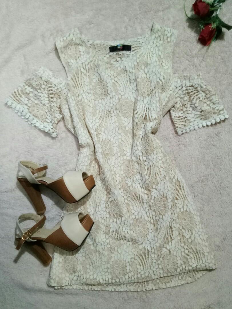 Lace dress (Category: Dresses) located in Marikina City. Submitted by threefty (Listing ID 198425163, Image 1). Description: Lace dress with cut out detail Cold shoulder Color: Nude With inner lining in nude color Fits Medium No flaws.