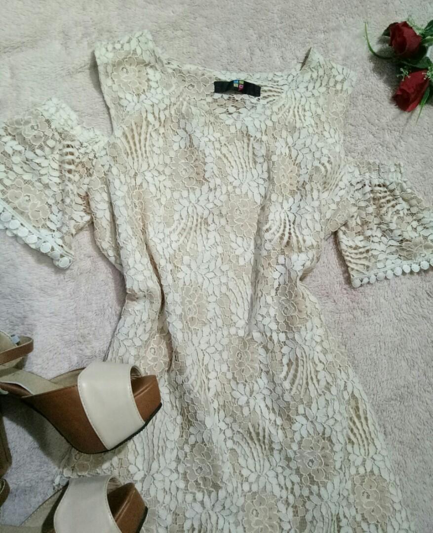Lace dress (Category: Dresses) located in Marikina City. Submitted by threefty (Listing ID 198425163, Image 2). Description: Lace dress with cut out detail Cold shoulder Color: Nude With inner lining in nude color Fits Medium No flaws.