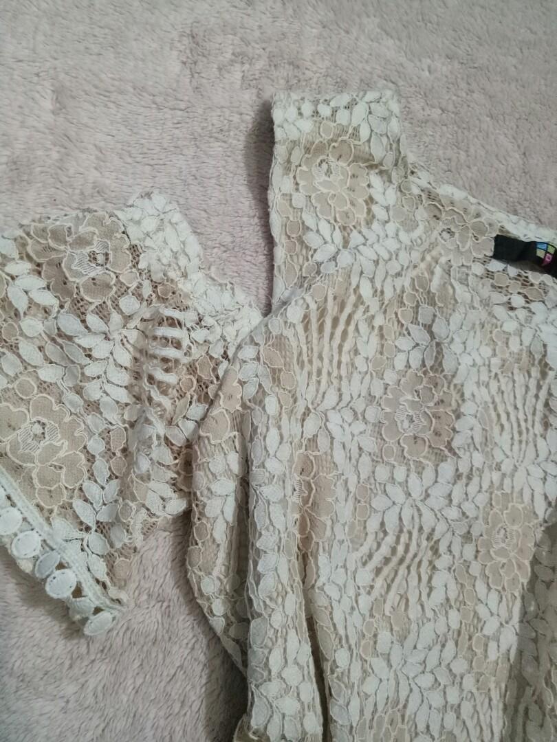 Lace dress (Category: Dresses) located in Marikina City. Submitted by threefty (Listing ID 198425163, Image 3). Description: Lace dress with cut out detail Cold shoulder Color: Nude With inner lining in nude color Fits Medium No flaws.