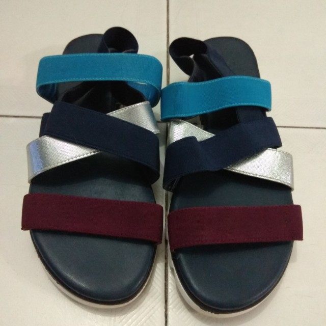 Sandals with elastic back strap clearance