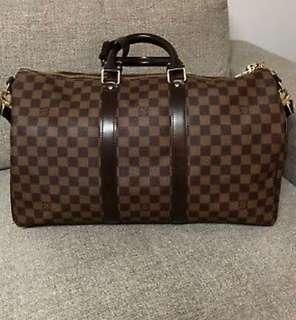 Louis Vuitton duffle travel bag