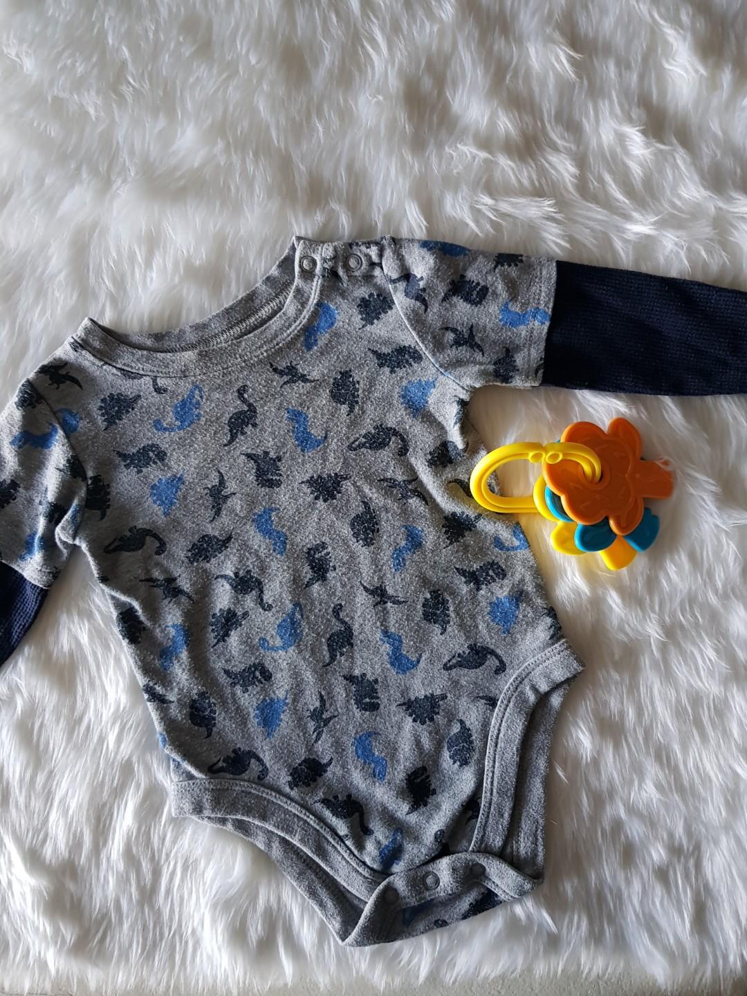 Garanimals Long Sleeve Onesie (Category: Babies & Kids Fashion) located in Manila. Submitted by grix08 (Listing ID 199059742, Image 1). Description: 12M VGUC No stains or flaws ♡ Please manage your expectations as these are preloved items unless stated brand new.