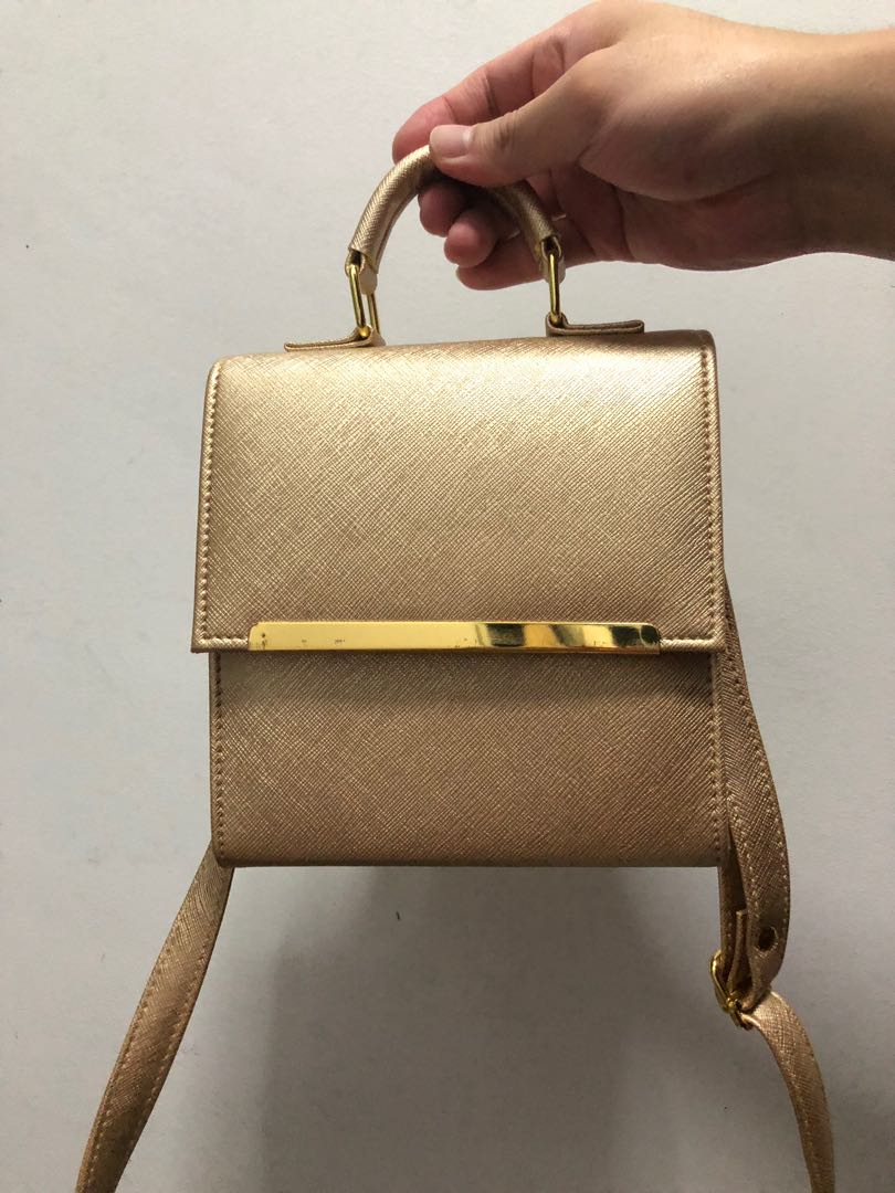Gold color handbag sale