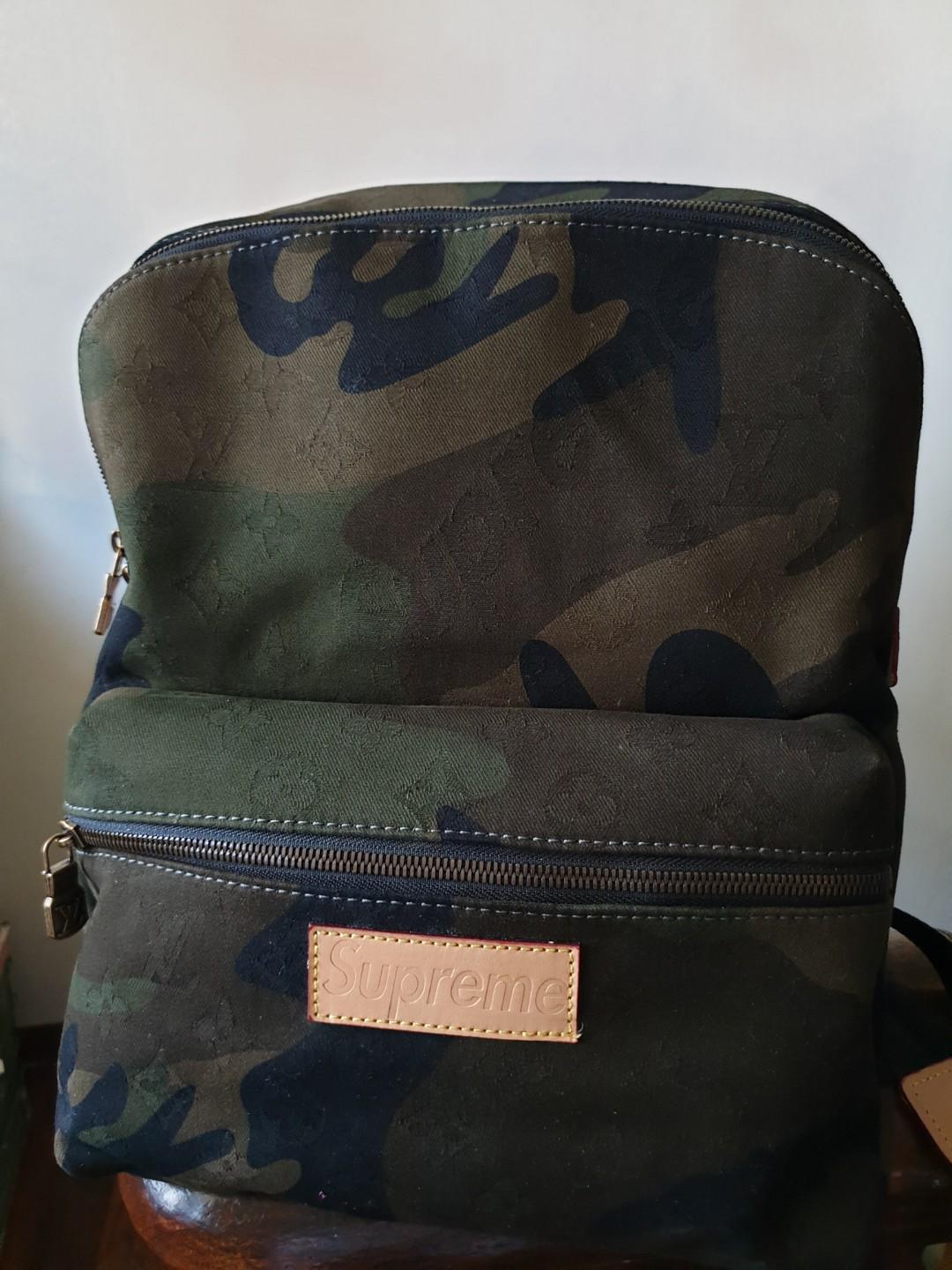 Supreme lv hotsell camo backpack