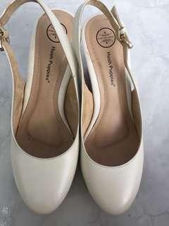Pump wedges hush puppies