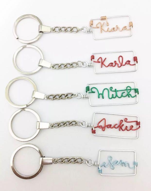 Personalized Wire Name Key Chain with Ring (Handmade) (Category: Handmade Craft) located in Bulacan. Submitted by miss_ehms (Listing ID 199293678, Image 1). Description: ✅ Maximum of 7 letters (additional letter after the 7th, plus 5 pesos per letter) ✅ No minimum order, made to order, allow 12-15 working days, lead time can be shorter depending on the work load we have. ✅ Just send us the name, indicate the letter for the color of wire you like.