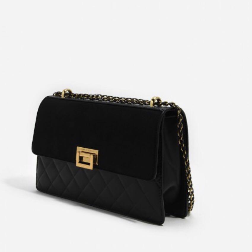 Charles Keith Quilted Push Lock Sling Bag Women S Fashion Bags Wallets Sling Bags On Carousell