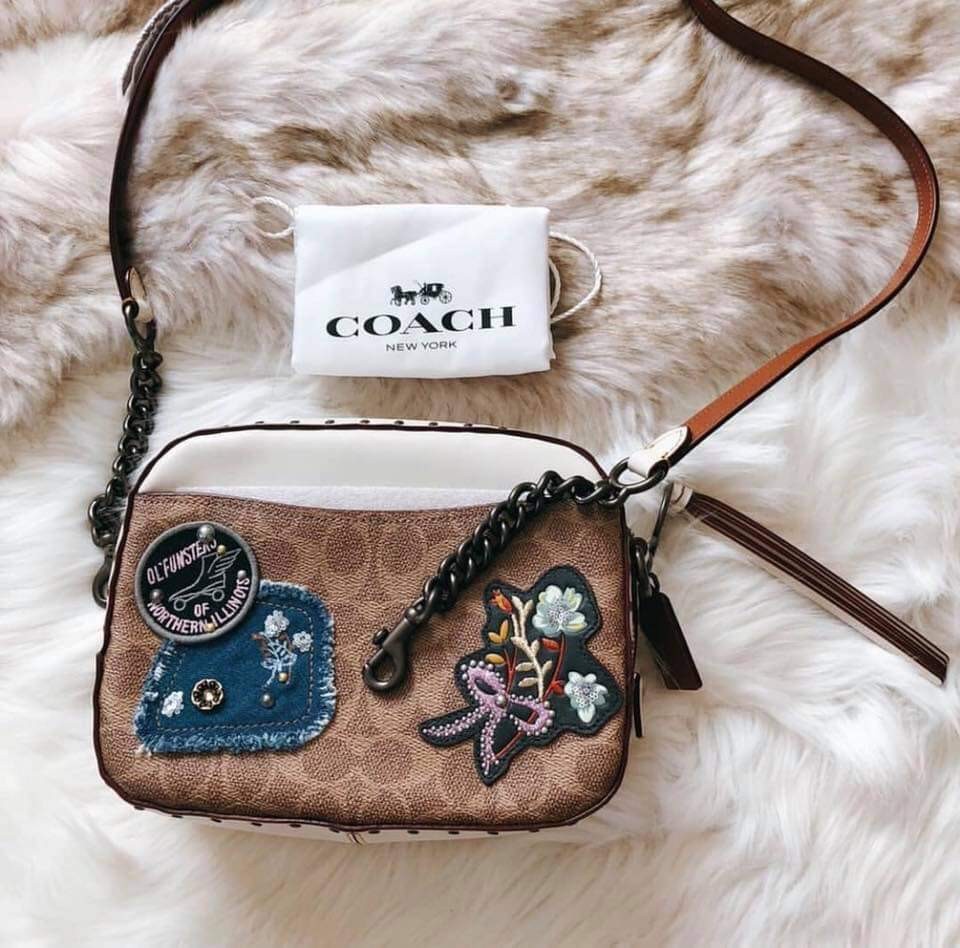 coach camera bag with rivets