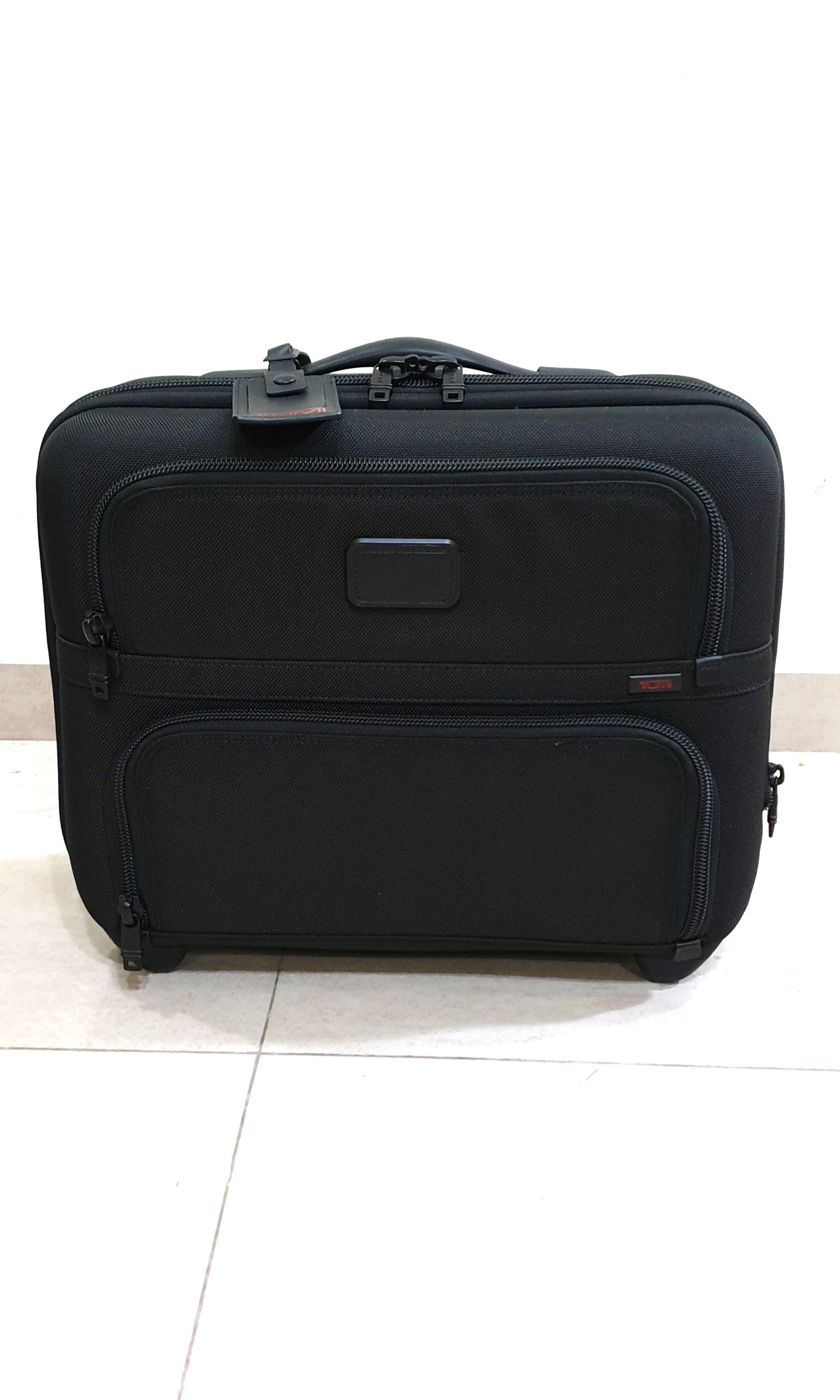 tumi overnight bag with wheels