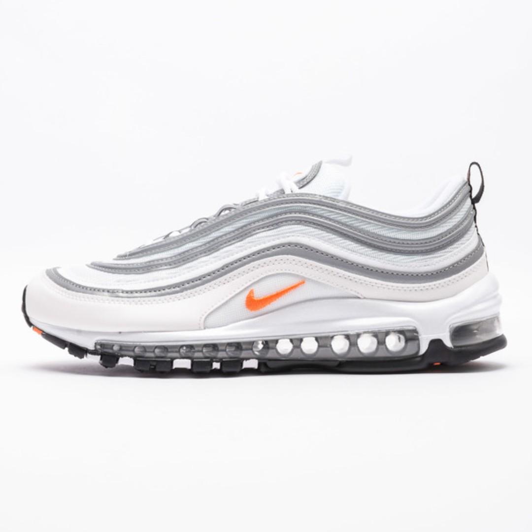 white and orange air max 97