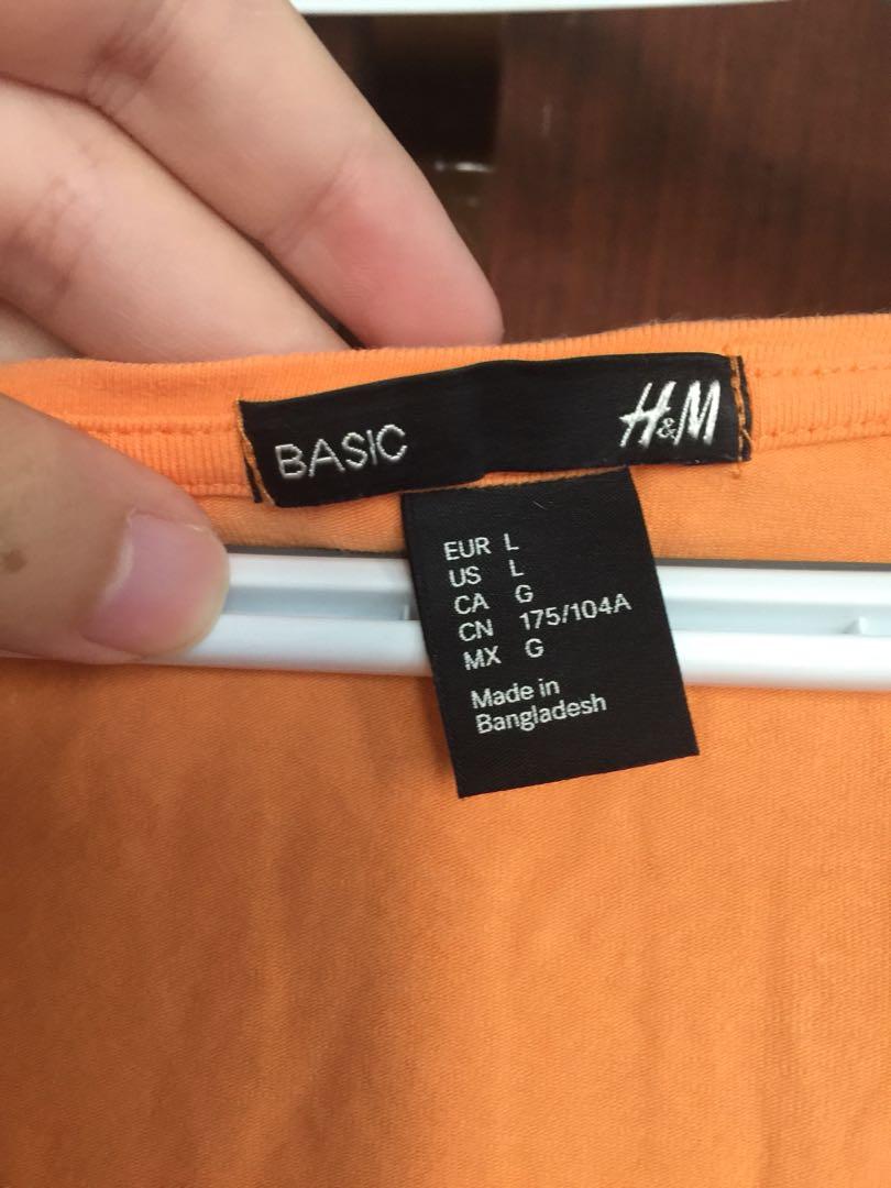 H&m Orange Basic Tee (Category: Others Tops) located in Cebu City. Submitted by crispylee (Listing ID 199830860, Image 2). Description: Used only a few times. Scoop neck. Stretchy material. Good condition. .