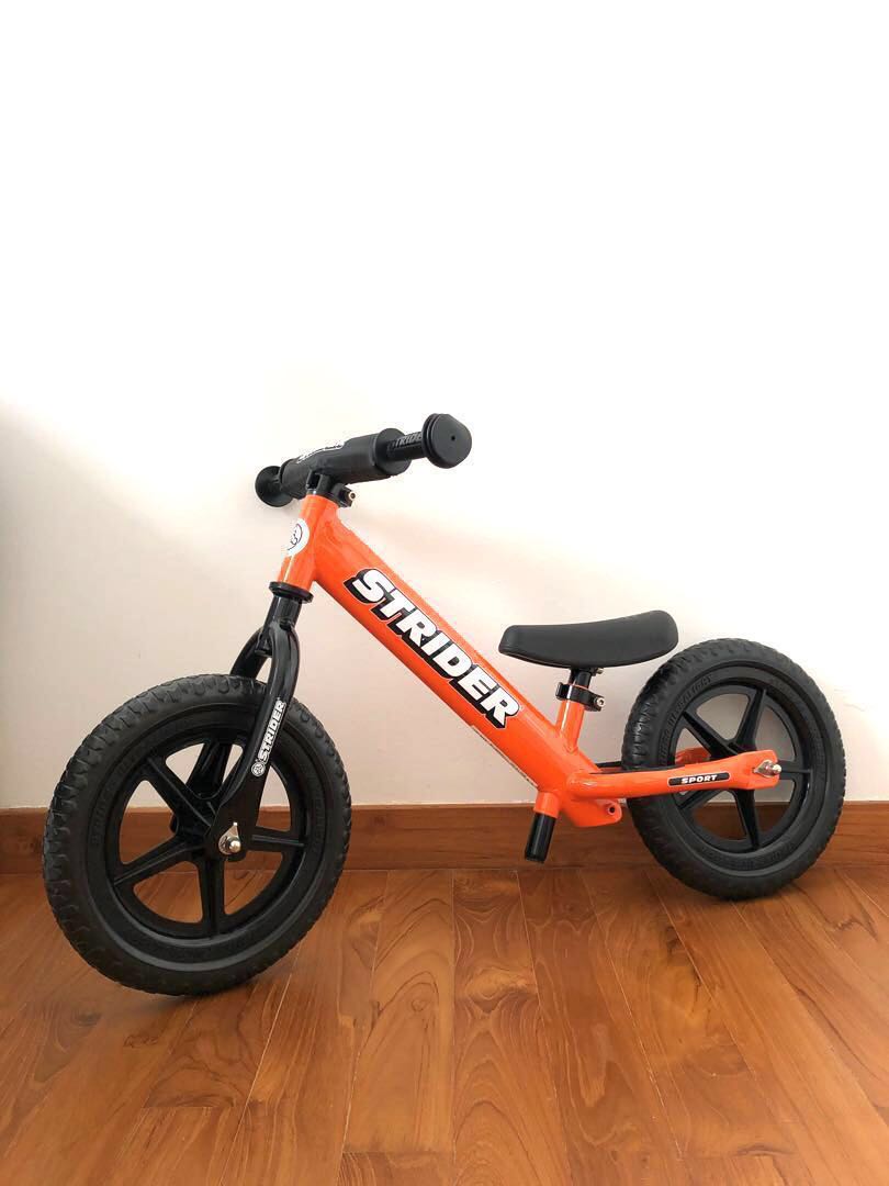 orange strider balance bike