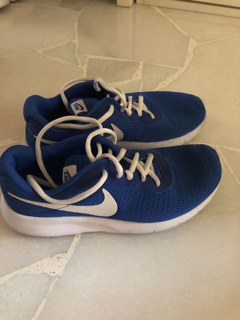 famous footwear nike tanjun