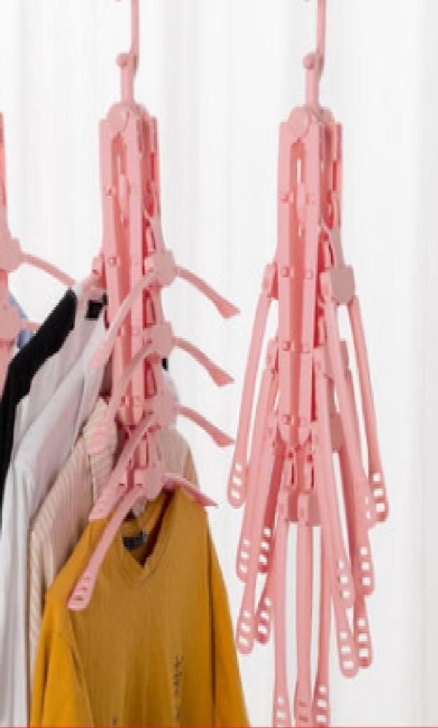 Multi-function magic hanger rack folding (Category: Home Improvement Tools & Accessories) located in Singapore. Submitted by jaslyn_chua (Listing ID 200096655, Image 2). Description: Multi-function magic hanger rack folding Pink colour Weight: 550g.