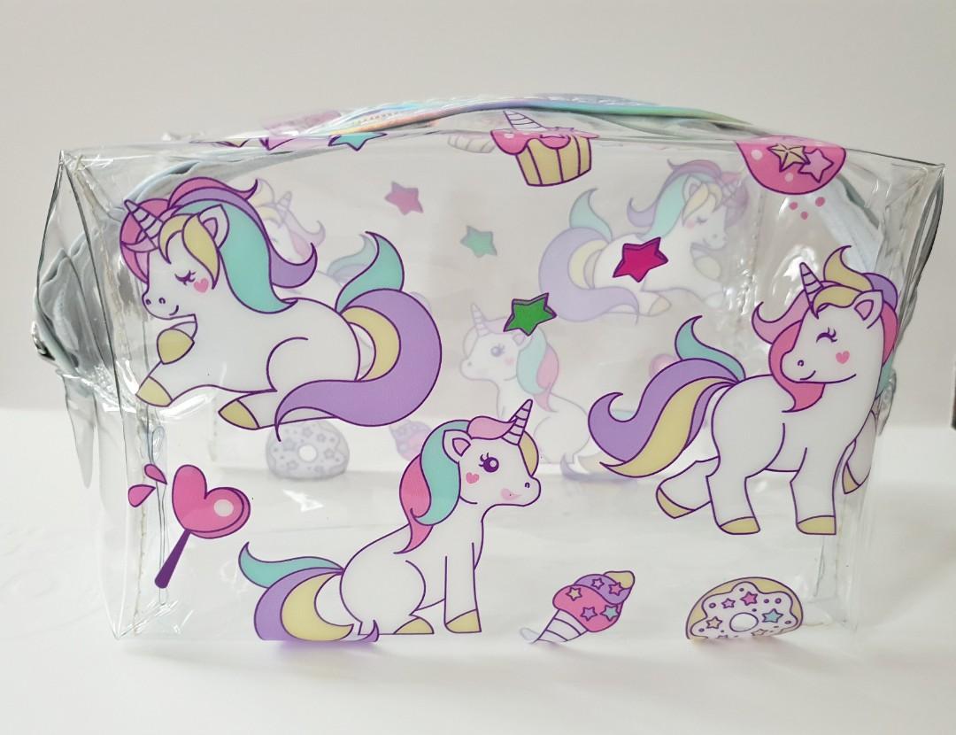 Unicorn-2 Transparent Pouch (Category: Purses & Pouches) located in Makati City. Submitted by craftyhandsofj (Listing ID 200123782, Image 1). Description: **BRAND NEW** 👝 Transparent pouch perfect for your make-up or you can use this as your oencil case or organizer! 👝 Transparent is perfect so you can see what's inside your bag! 👝 Baby unicorn design 👝 Material: Plastic 👝 Excellent quality 📍A liitle bit bigger than the Panda and Unicorn-1 