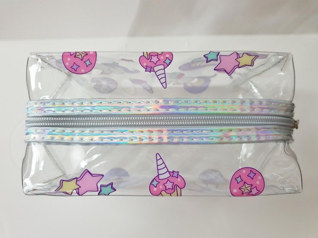 Unicorn-2 Transparent Pouch (Category: Purses & Pouches) located in Makati City. Submitted by craftyhandsofj (Listing ID 200123782, Image 3). Description: **BRAND NEW** 👝 Transparent pouch perfect for your make-up or you can use this as your oencil case or organizer! 👝 Transparent is perfect so you can see what's inside your bag! 👝 Baby unicorn design 👝 Material: Plastic 👝 Excellent quality 📍A liitle bit bigger than the Panda and Unicorn-1 