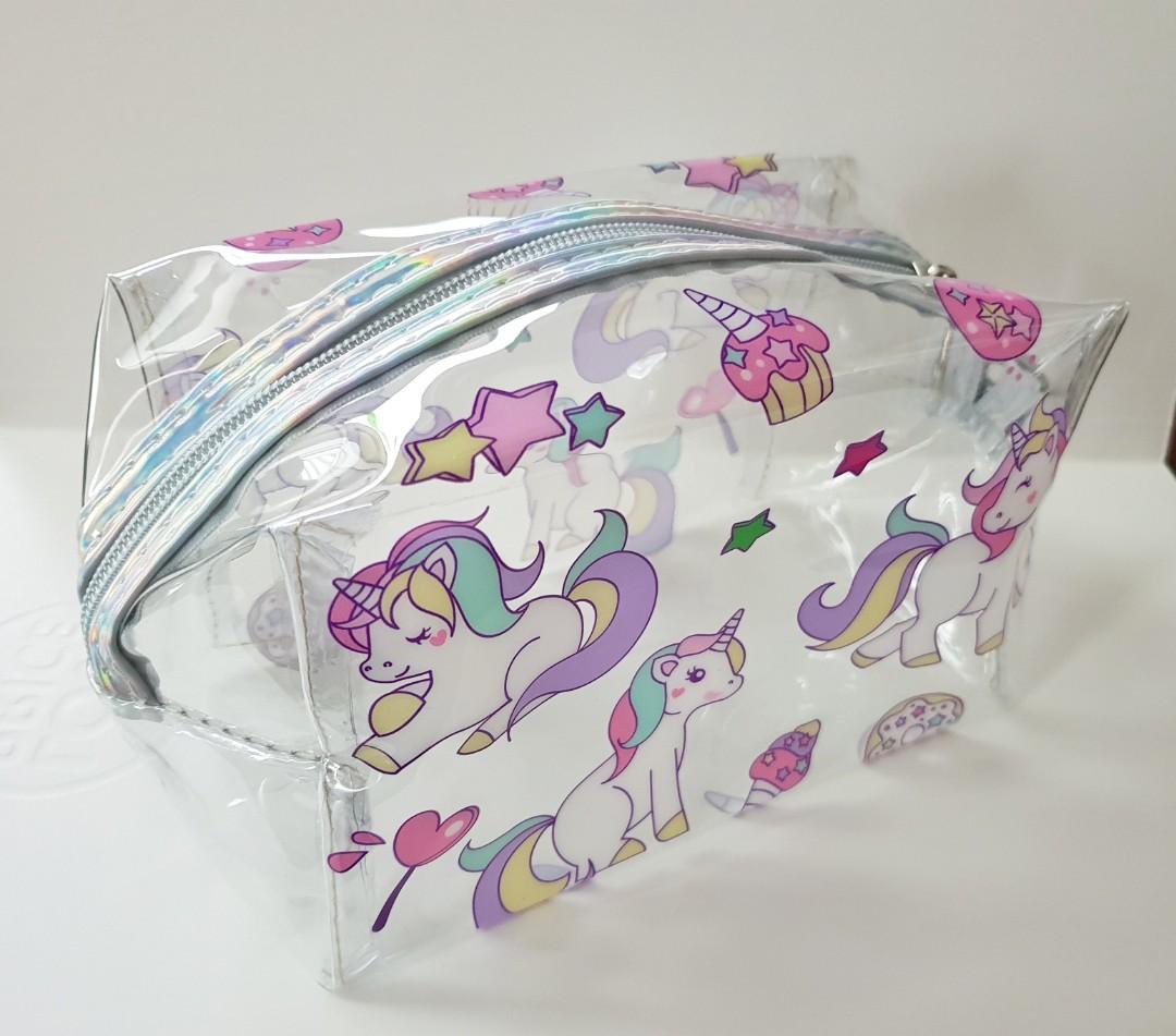 Unicorn-2 Transparent Pouch (Category: Purses & Pouches) located in Makati City. Submitted by craftyhandsofj (Listing ID 200123782, Image 2). Description: **BRAND NEW** 👝 Transparent pouch perfect for your make-up or you can use this as your oencil case or organizer! 👝 Transparent is perfect so you can see what's inside your bag! 👝 Baby unicorn design 👝 Material: Plastic 👝 Excellent quality 📍A liitle bit bigger than the Panda and Unicorn-1 