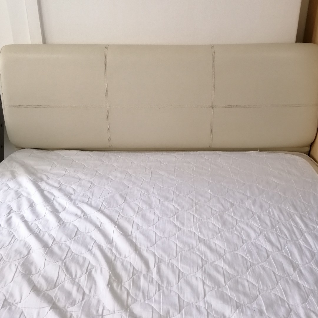Bed frame with cushioned fauxleather covered headboard, Furniture