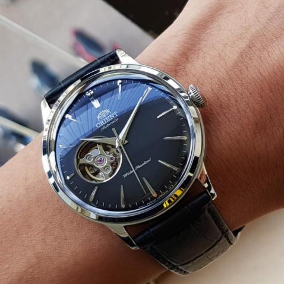 Open - entre bambino open heart et spinnaker sorrento Bnib_orient_classicelegant_open_heart_blue_dial_automatic_raag0005l10b_mens_watch_1542531910_5689b8d30_progressive