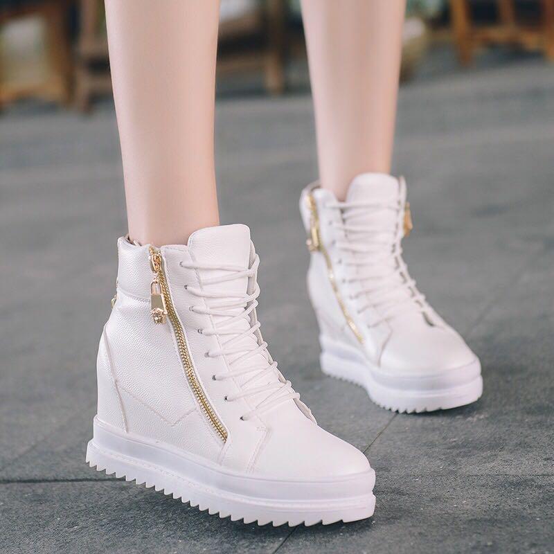 white sneakers with gold zipper