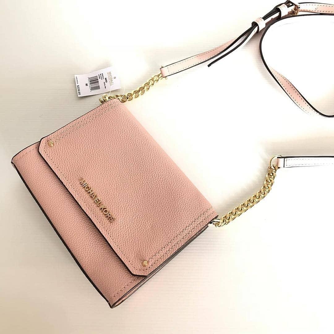 MK hayes small clutch pastel pink