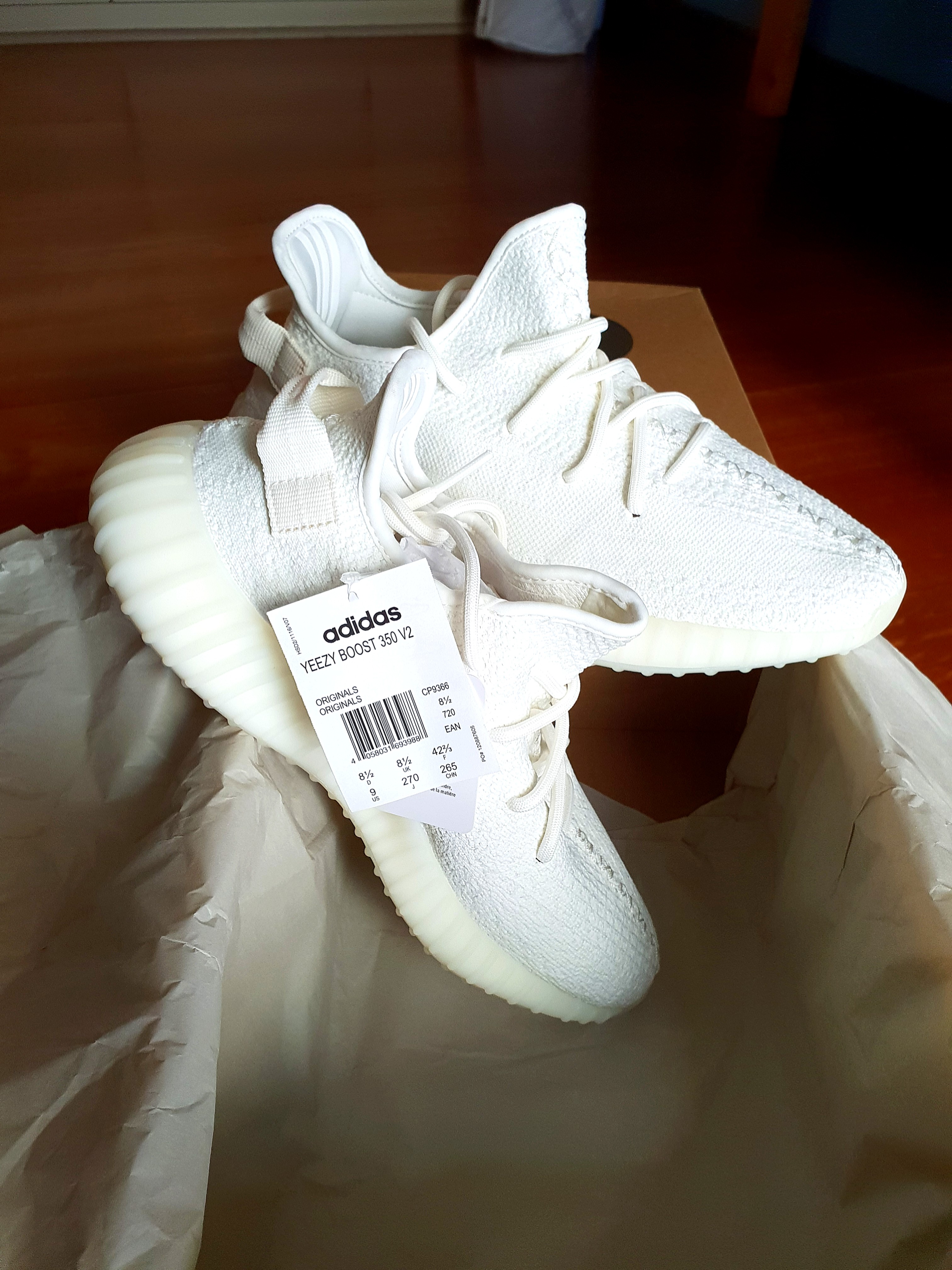 yeezy supply triple white shipping
